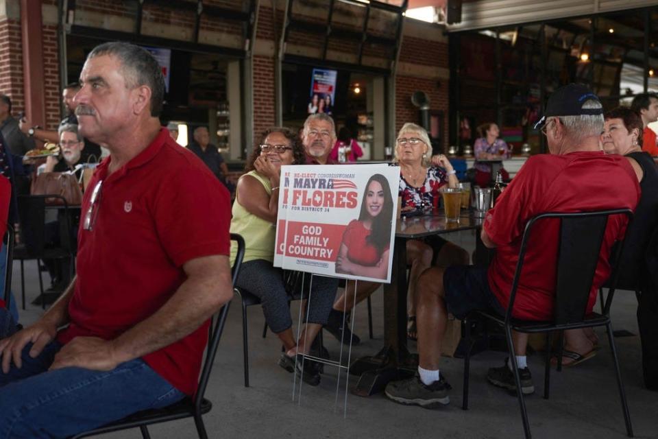 People attend a campaign event for Monica De La Cruz, Republican candidate for Congress, and US Representative Mayra Flores, R-Texas, who is running for reelection, at the University Drafthouse in Mcallen, Texas, on October 10, 2022.