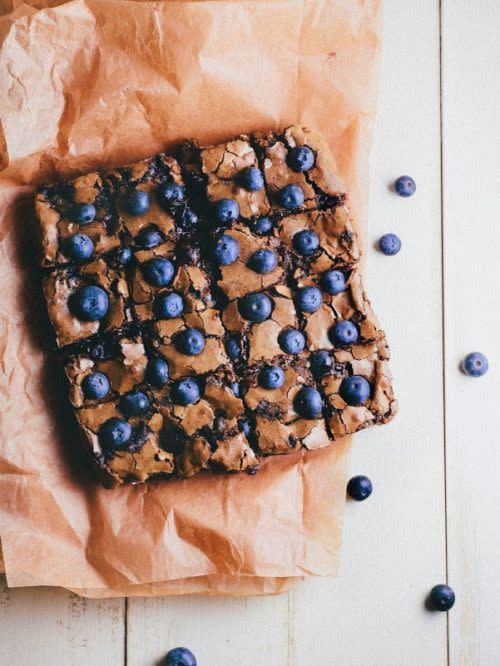 <p>Give your chocolatey brownies some fruity flavor with a handful of blueberries. It's a sweet surprise in this classic treat. </p><p><strong>Get the recipe at <a href="https://www.hummingbirdhigh.com/2014/07/blueberry-brownies.html" rel="nofollow noopener" target="_blank" data-ylk="slk:Hummingbird High" class="link ">Hummingbird High</a>.</strong></p>