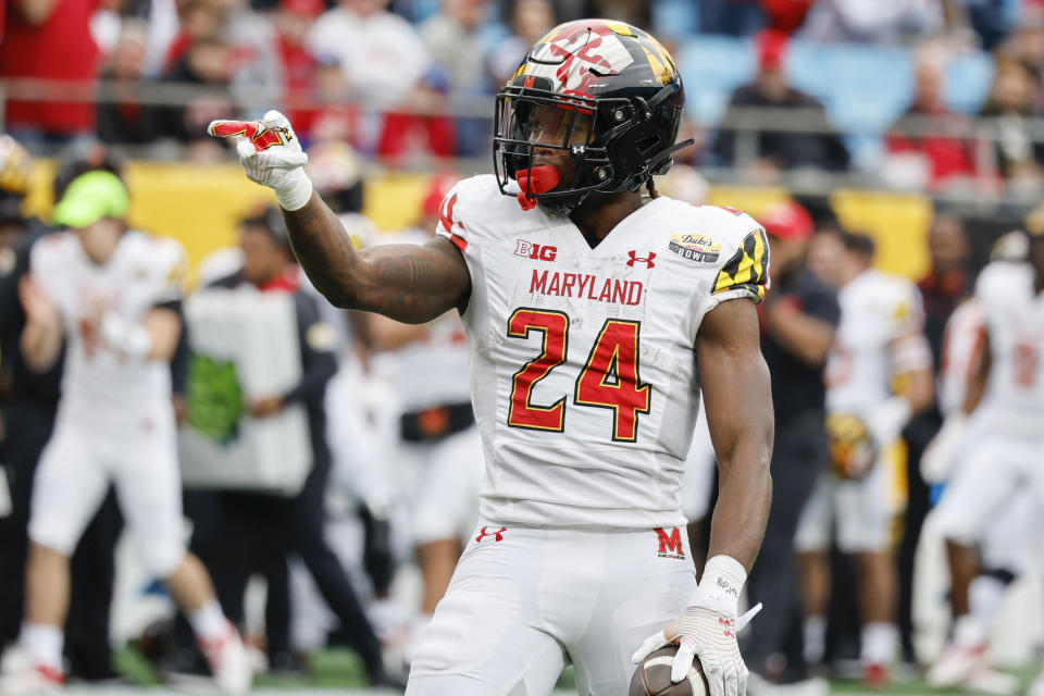Maryland running back Roman Hemby signals a first down after a run against North Carolina State during the first half of the Duke's Mayo Bowl NCAA college football game in Charlotte, N.C., Friday, Dec. 30, 2022. (AP Photo/Nell Redmond)