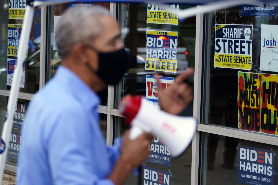 Former President Barack Obama speaks speaks to volunteers outside of a Democratic Voter Activation Center as he campaigns for Democratic presidential candidate former Vice President Joe Biden, Wednesday, Oct. 21, 2020, in Philadelphia. (AP Photo/ Matt Slocum)