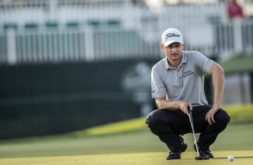 John Merrick lines up his putt on the ninth hole during the first round of the Arnold Palmer Invitational golf tournament at Bay Hill, Thursday, March 20, 2014, in Orlando, Fla. (AP Photo/Willie J. Allen Jr.)