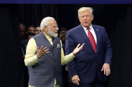 U.S. President Donald Trump and India's Prime Minister Narendra Modi participate in the "Howdy Modi" event in Houston