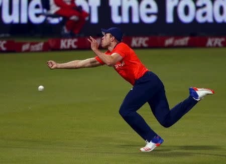 England's David Willey drops a catch during the Twenty20 (T20) International cricket match against South Africa in Cape Town, South Africa, February 19, 2016. REUTERS/Mike Hutchings