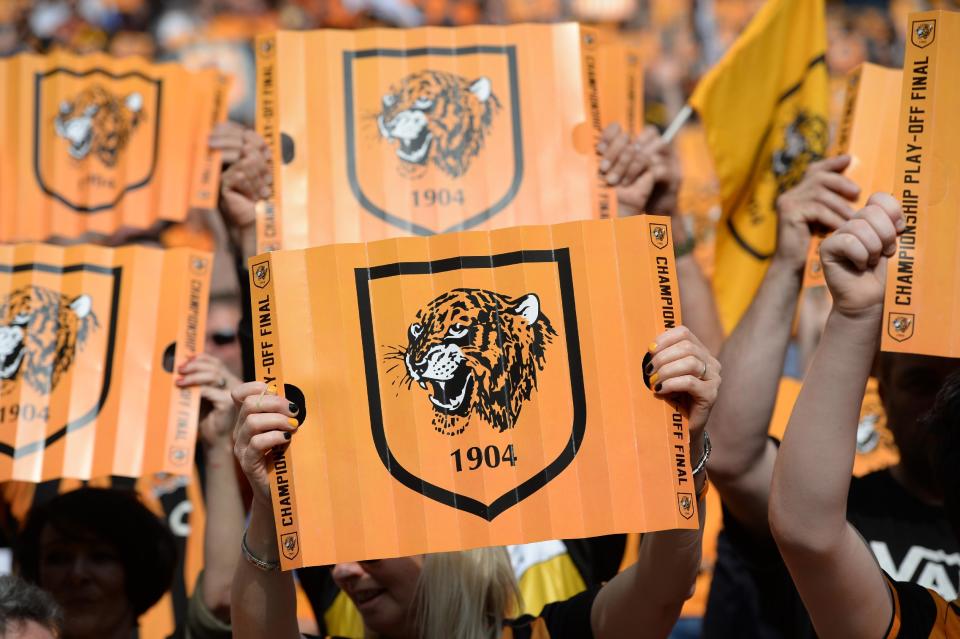 Britain Soccer Football - Hull City v Sheffield Wednesday - Sky Bet Football League Championship Play-Off Final - Wembley Stadium - 28/5/16 Hull fans hold up banners before the game Action Images via Reuters / Tony O'Brien Livepic EDITORIAL USE ONLY. No use with unauthorized audio, video, data, fixture lists, club/league logos or "live" services. Online in-match use limited to 45 images, no video emulation. No use in betting, games or single club/league/player publications. Please contact your account representative for further details.