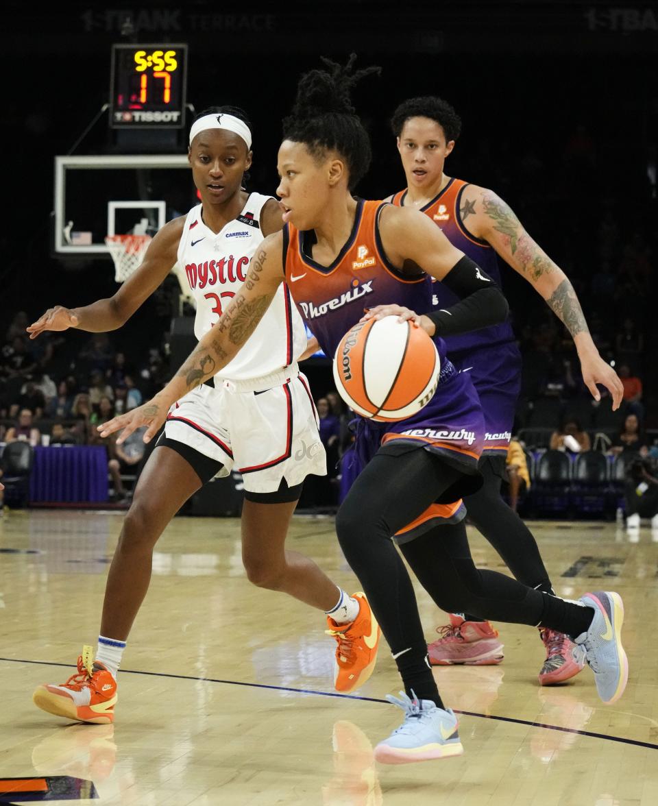 Phoenix Mercury guard Sug Sutton (1) moves forward the basket against Washington Mystics guard Shatori Walker-Kimbrough (32) at Footprint Center in Phoenix on Sept. 5, 2023.