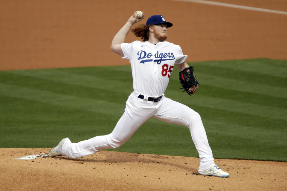 Los Angeles Dodgers starting pitcher Dustin May throws to a San Diego Padres batter during the first inning of a baseball game in Los Angeles, Sunday, April 25, 2021. (AP Photo/Alex Gallardo)