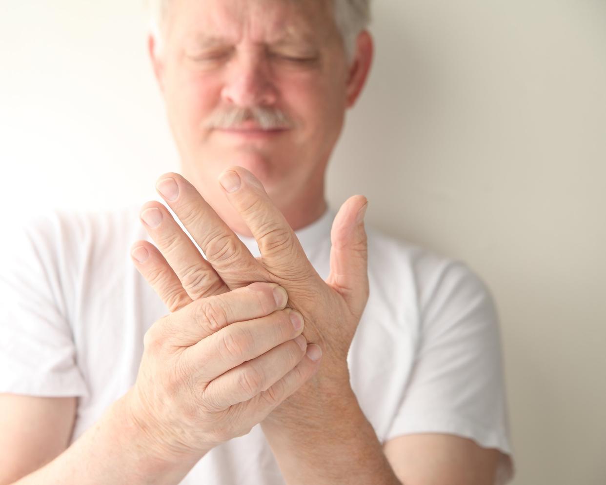 older man has numbness and tingling in his hand