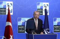 Turkey's President Recep Tayyip Erdogan speaks during a media conference at a NATO summit in Brussels, Monday, June 14, 2021. U.S. President Joe Biden is taking part in his first NATO summit, where the 30-nation alliance hopes to reaffirm its unity and discuss increasingly tense relations with China and Russia, as the organization pulls its troops out after 18 years in Afghanistan. (Yves Herman, Pool via AP)