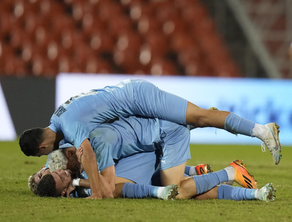 Israel's players celebrate after defeating Uzbekistan 1-0 and making it to the next round of the FIFA U-20 World Cup at the Malvinas Argentinas stadium in Mendoza, Argentina, Tuesday, May 30, 2023. (AP Photo/Natacha Pisarenko)