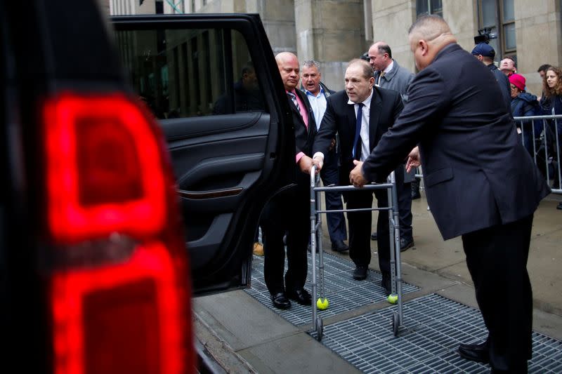 Film producer Weinstein arrives to his car after leaving the the New York Supreme Court in New York