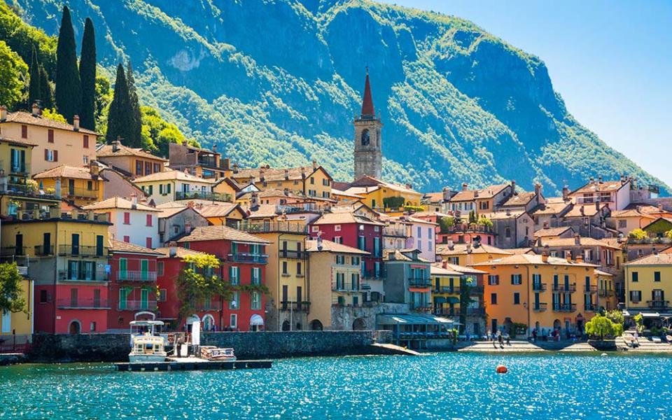 Varenna clings onto a rocky headland facing Bellagio’s Punta Spartivento that lies across the water - GETTY