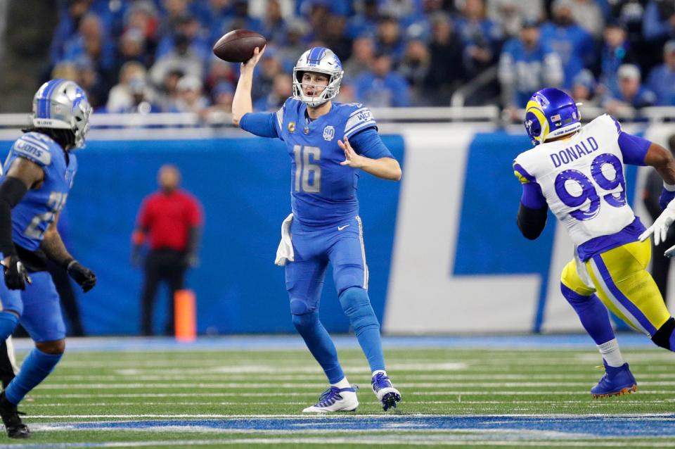 Detroit Lions quarterback Jared Goff looks to pass the ball during the first half against the L.A. Rams at Ford Field in Detroit on Sunday, Jan. 14, 2024.