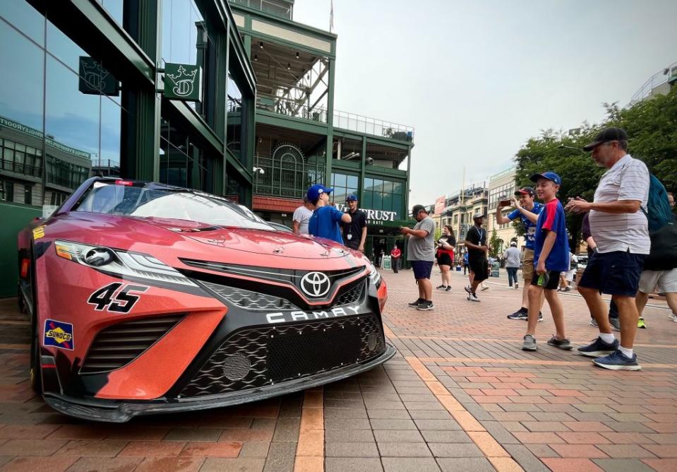 Tyler Reddick‘s No. 45 23XI Racing show car outside Wrigley Field