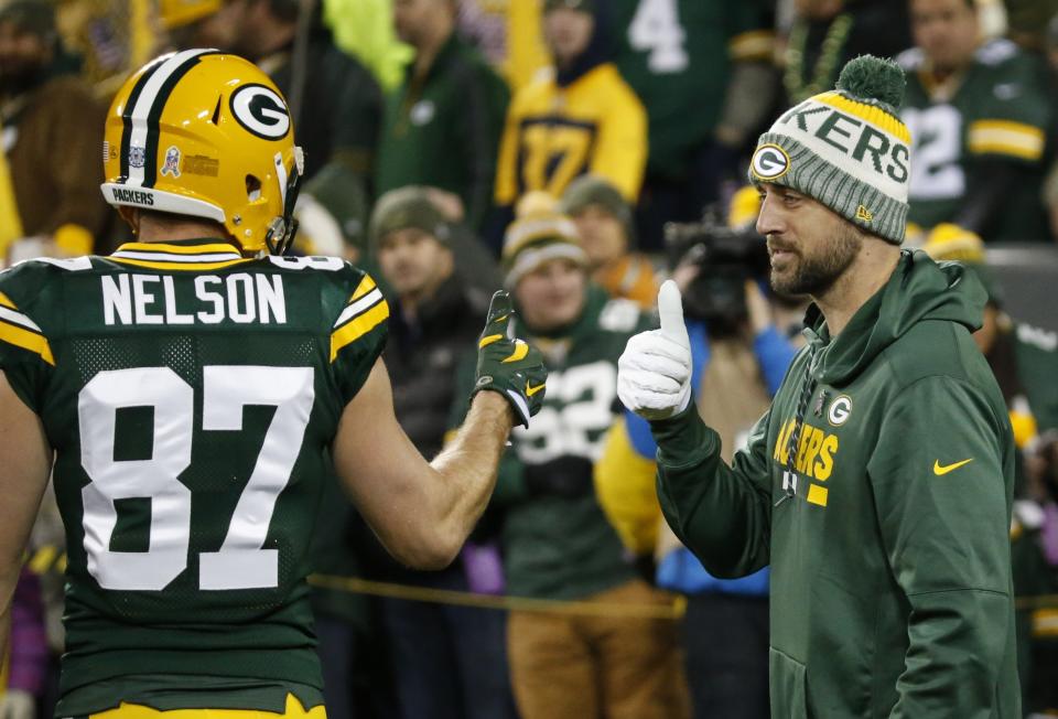 Jordy Nelson defended his former teammate Aaron Rodgers this week, saying criticism of the Packers quarterback”doesn’t make sense.” (AP/Mike Roemer)