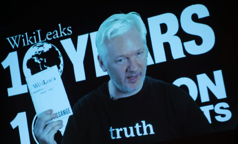 Julian Assange, founder of WikiLeaks, addresses journalists via a live video feed on October 4, 2016 in Berlin