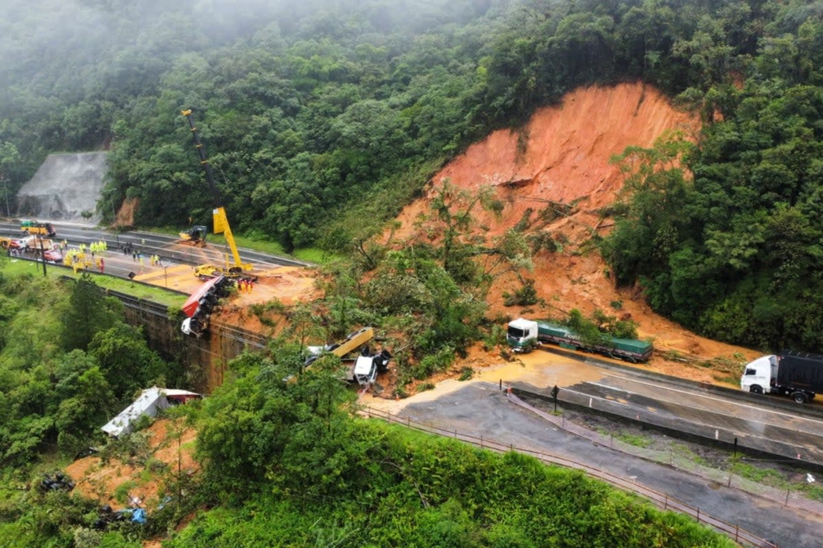 Aerial images show mud engulfing the major road  (via REUTERS)