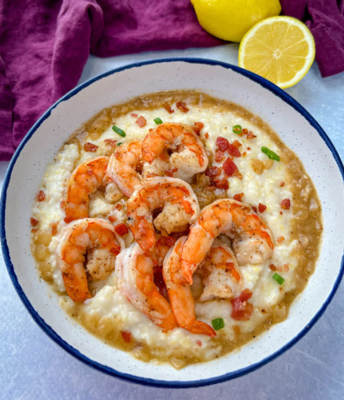<p>Black People's Recipes</p><p>This Black Folks Shrimp and Grits recipe is made with fluffy, creamy stone ground grits and served with Southern Creole seasoned gravy. Pair this soul food staple with any of your favorite seafood or shellfish.</p><p><strong>Get the recipe: <a href="https://blackpeoplesrecipes.com/black-folks-shrimp-and-grits/" rel="nofollow noopener" target="_blank" data-ylk="slk:Black Folks Shrimp and Grits;elm:context_link;itc:0;sec:content-canvas" class="link rapid-noclick-resp">Black Folks Shrimp and Grits</a></strong></p>