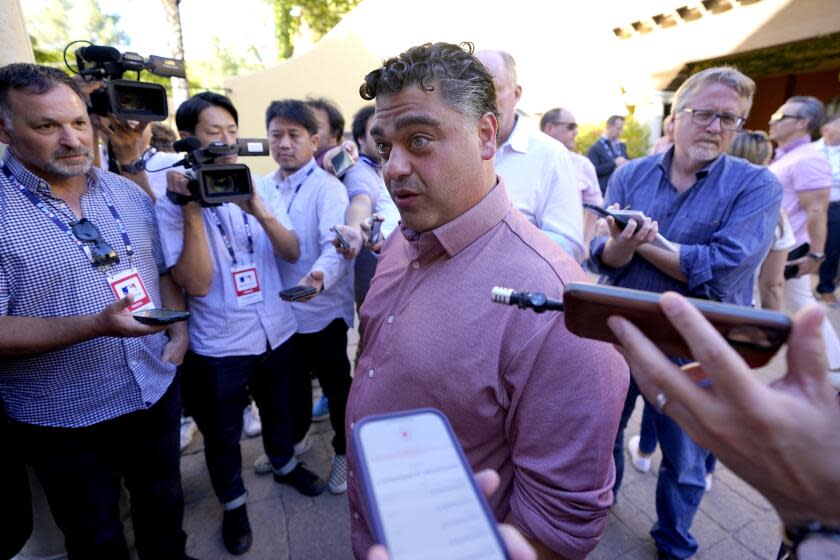 Los Angeles Angels general manager Perry Minasian speaks to reporters on Nov. 7, 2023, in Scottsdale, Ariz.