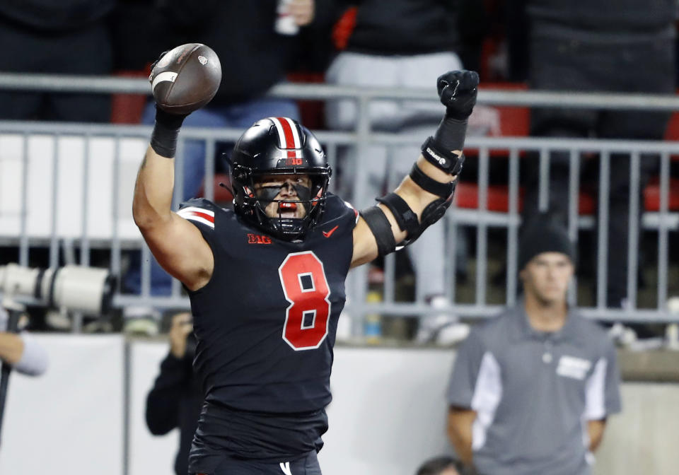 Sep 24, 2022; Columbus, Ohio, USA; Ohio State Buckeyes tight end Cade Stover (8) celebrates the touchdown catch during the first quarter against the Wisconsin Badgers at Ohio Stadium. Mandatory Credit: Joseph Maiorana-USA TODAY Sports