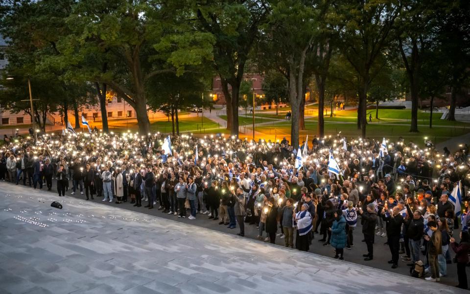 A memorial service for those killed in a Hamas attack in Israel was held on the steps of Widner Library at Harvard University on Oct 15