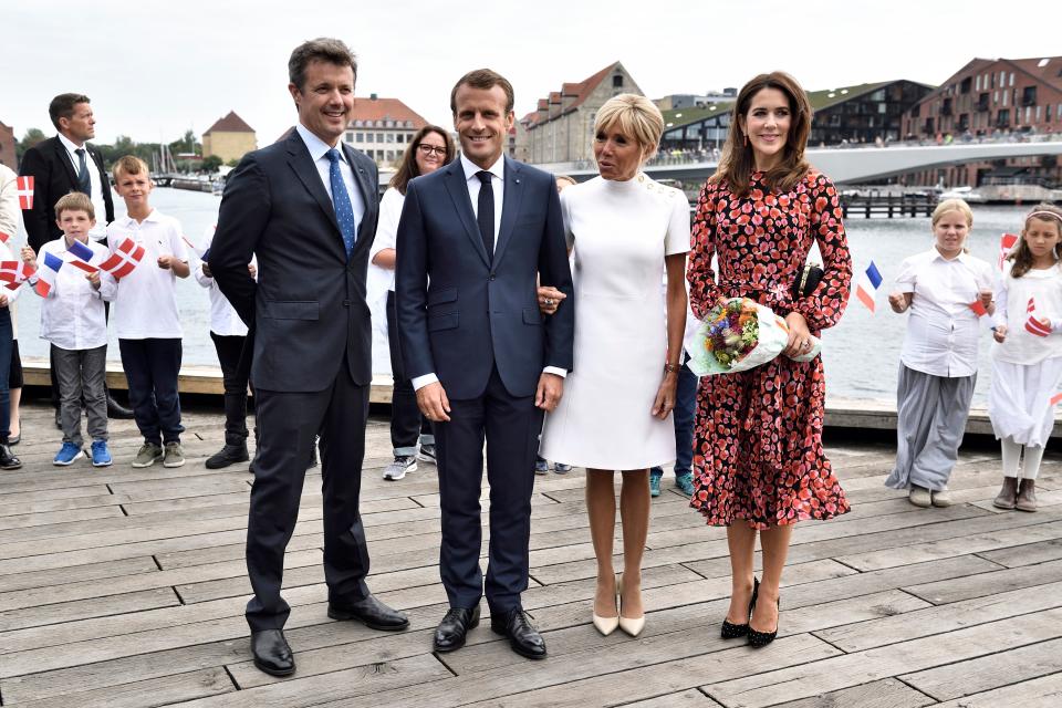 <p>Things came to a close just 48 hours later with a farewell ceremony at the Royal Theatre. Brigitte stunned in a white, 60s style frock, and Mary likewise stayed true to her fashion favourites with a patterened, midi-length dress. Photo: Getty </p>