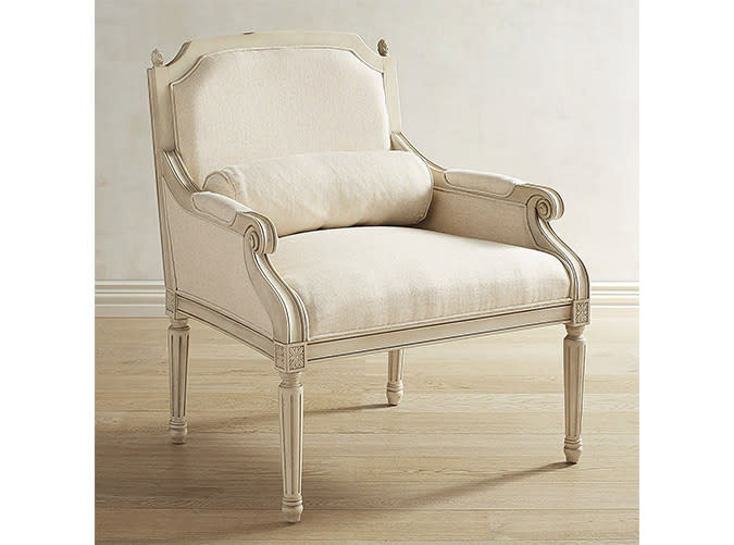 <p>Hello, Louis XVI accent chair of our dreams.</p> <p><a rel="nofollow noopener" href="http://www.pier1.com/magnolia-home-cambridge-ivory-chair/3260982.html" target="_blank" data-ylk="slk:Cambridge Ivory Chair;elm:context_link;itc:0;sec:content-canvas" class="link "><em>Cambridge Ivory Chair</em></a><em> ($670)</em></p>