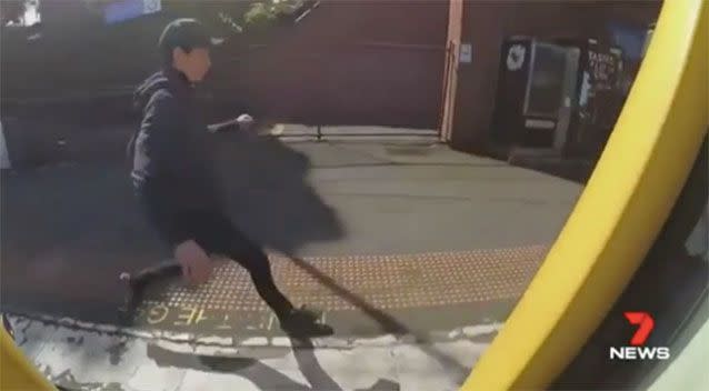 A train surfer jumps off a train after riding on the back. Source: 7News
