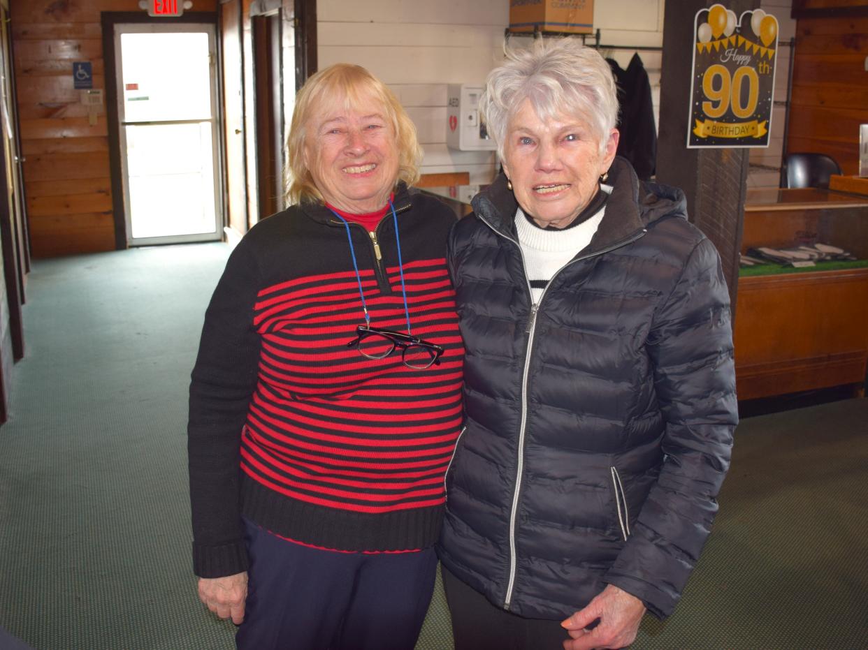 Judy Chambers (left) poses with longtime friend and golf partner Ellie Boegler (right) at a surprise party honoring Boegler's 90th birthday at the John F. Parker Golf Course on March 25, 2024.