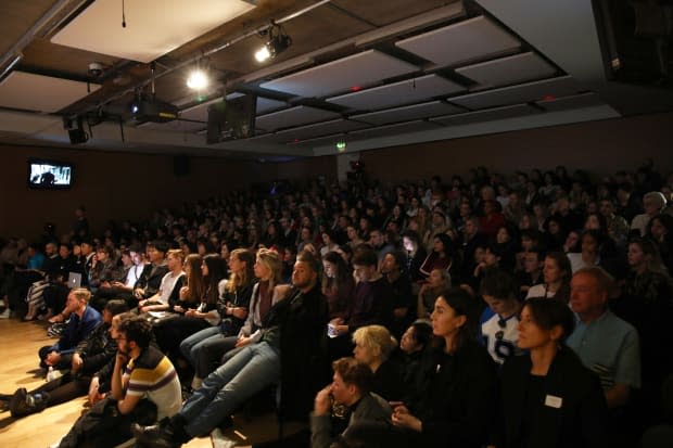 Students attend a conversation hosted by Central Saint Martins. Photo: John Phillips/Getty Images