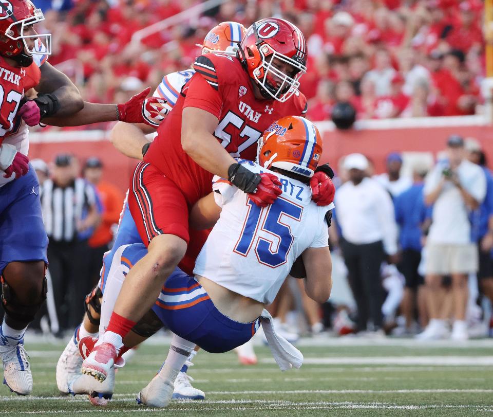 Utah Utes defensive tackle Keanu Tanuvasa (57) sacks Florida Gators quarterback Graham Mertz (15) in Salt Lake City on Thursday, Aug. 31, 2023 during the season opener. | Jeffrey D. Allred, Deseret News