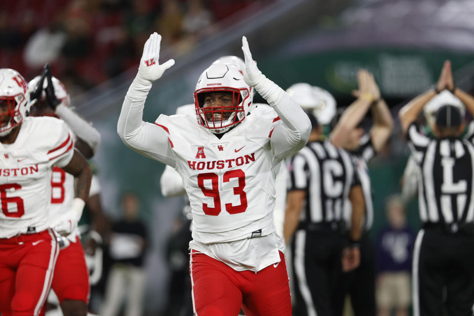 Houston defensive lineman Atlias Bell reacts to a safety against South Florida during the first half of an NCAA college football game Saturday, Nov. 6, 2021, in Tampa, Fla. (AP Photo/Scott Audette)