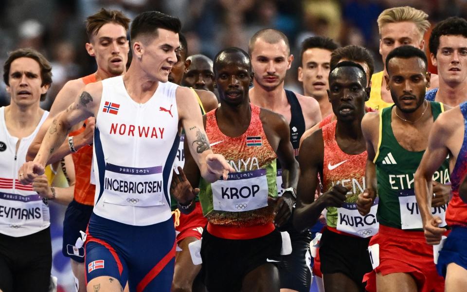 Norway's Jakob Ingebrigtsen, Kenya's Jacob Krop, Kenya's Edwin Kurgat, Ethiopia's Addisu Yihune and other athletes compete in the men's 5000m final