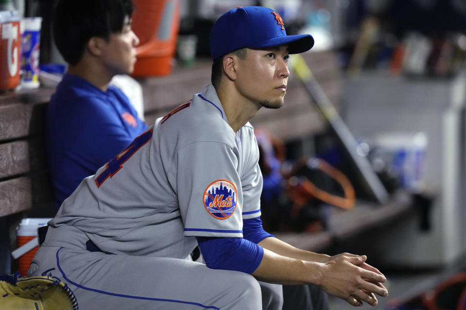 New York Mets starting pitcher Kodai Senga sits in the dugout during the fourth inning of the team's baseball game against the Miami Marlins, Wednesday, Sept. 20, 2023, in Miami. (AP Photo/Lynne Sladky)