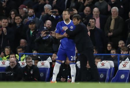 Britain Football Soccer - Chelsea v Southampton - Premier League - Stamford Bridge - 25/4/17 Chelsea's John Terry speaks to manager Antonio Conte before coming on as a substitute Reuters / Stefan Wermuth Livepic