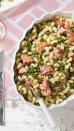 <p>Coated in a butter-white wine sauce, this delicious dish is a fresh take on pasta primavera featuring roasted salmon and snappy English peas. </p><p><strong><a href="https://www.countryliving.com/food-drinks/a30872122/spring-pasta-with-salmon-peas-dill-recipe/" rel="nofollow noopener" target="_blank" data-ylk="slk:Get the recipe;elm:context_link;itc:0;sec:content-canvas" class="link ">Get the recipe</a>.</strong> </p>
