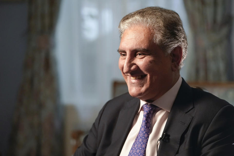 Pakistan's Foreign Minister Shah Mehmood Qureshi smiles during an interview with The Associated Press, Wednesday, Sept. 22, 2021, in New York. (AP Photo/Mary Altaffer)