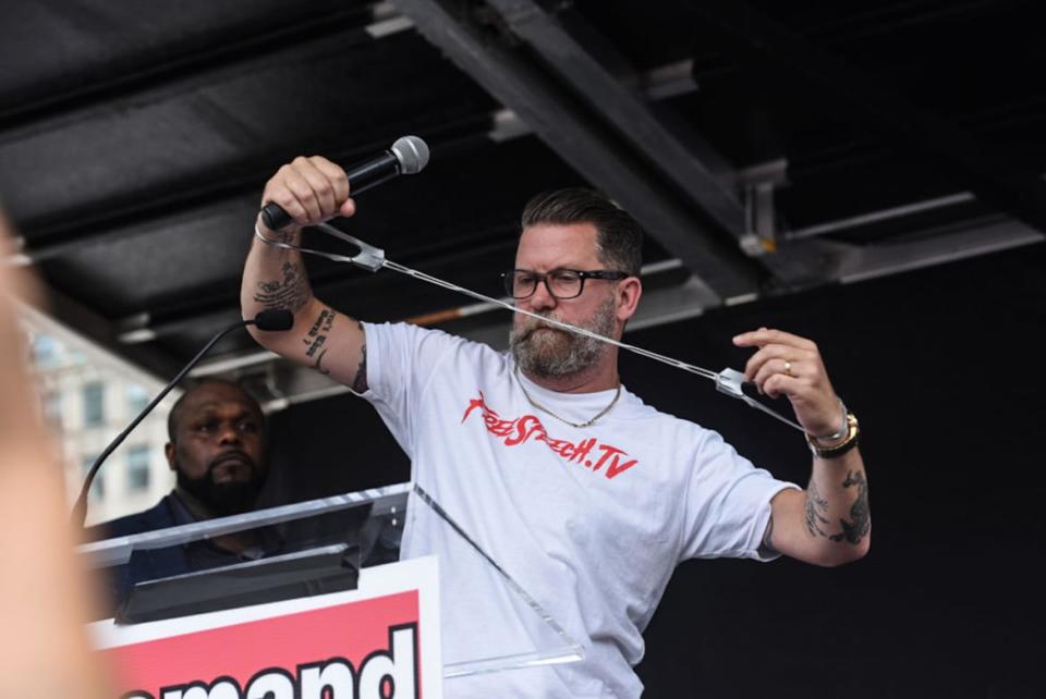 <div class="inline-image__caption"><p>Proud Boys founder <span class="caas-xray-inline-tooltip"><span class="caas-xray-inline caas-xray-entity caas-xray-pill rapid-nonanchor-lt" data-entity-id="Gavin_McInnes" data-ylk="cid:Gavin_McInnes;pos:2;elmt:wiki;sec:pill-inline-entity;elm:pill-inline-text;itc:1;cat:Actor;" tabindex="0" aria-haspopup="dialog"><a href="https://search.yahoo.com/search?p=Gavin%20McInnes" data-i13n="cid:Gavin_McInnes;pos:2;elmt:wiki;sec:pill-inline-entity;elm:pill-inline-text;itc:1;cat:Actor;" tabindex="-1" data-ylk="slk:Gavin McInnes;cid:Gavin_McInnes;pos:2;elmt:wiki;sec:pill-inline-entity;elm:pill-inline-text;itc:1;cat:Actor;" class="link ">Gavin McInnes</a></span></span> wears fake handcuffs backstage during a “Demand Free Speech” rally on Freedom Plaza on July 6, 2019 in Washington, DC.</p></div> <div class="inline-image__credit">Photo by Stephanie Keith/Getty Images</div>