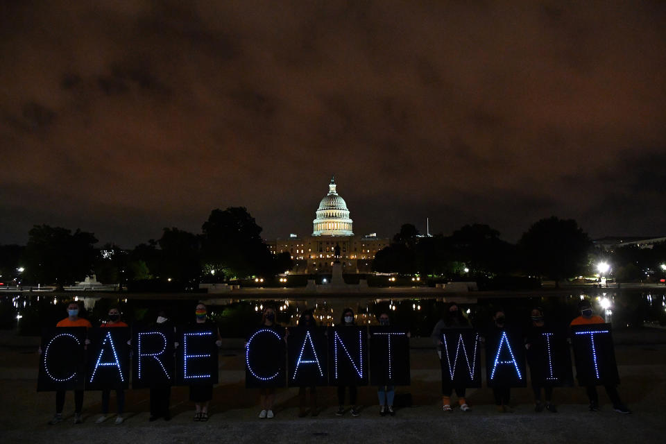 Disability rights activists and caregiving advocates hold a vigil in front of the U.S. Capitol, urging Congress to include full federal funding for home and community based care services in the Build Back Better budget package in Washington, D.C., on Oct. 06, 2021.<span class="copyright">Larry French—The Arc of the United States/Getty Images</span>