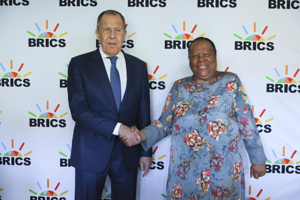 In this handout photo released by Russian Foreign Ministry Press Service, Russian Foreign Minister Sergey Lavrov, left, and South Africa's Minister of International Relations and Cooperation Naledi Pandor shake hands during their meeting on the sideline of a BRICS Foreign Ministers meeting in Cape Town, South Africa, Thursday, June 1, 2023. (Russian Foreign Ministry Press Service via AP)