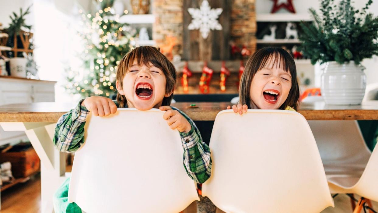  Christmas jokes illustrated by Kids laughing at Christmas. 