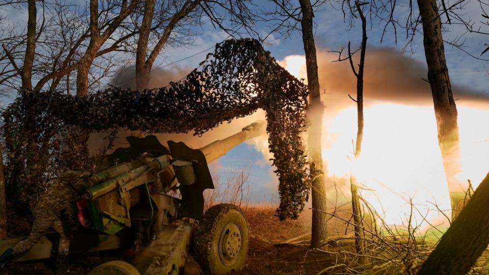 PHOTO: An artillery division of the 59th brigade fires on Russian forces on the frontline near Donetsk, Dec. 23, 2022, in Donetsk, Ukraine. The division is firing 152 mm rounds with a Howitzer D20 cannon supplied by the United States of America.  (Pierre Crom/Getty Images)