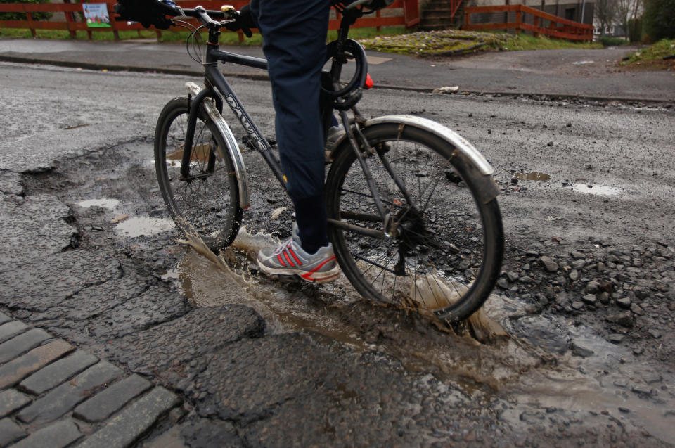 Hundreds of cyclists have been injured by potholes in recent years (Getty Images)