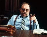 America actor Wilford Brimley (as Wells) points as he sits behind a desk in a scene from 'Absence of Malice' (directed by Sydney Pollack), 1981. (Photo by Silver Screen Collection/Getty Images)