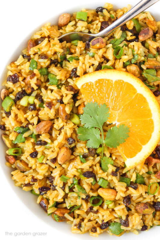 <p>The Garden Grazer</p><p>A curried brown rice salad with flavorful orange-curry dressing and crunchy pistachios.</p><p><strong>Get the recipe: <a href="https://www.thegardengrazer.com/curried-rice-salad-with-orange/" rel="nofollow noopener" target="_blank" data-ylk="slk:Curried Rice Salad with Orange;elm:context_link;itc:0;sec:content-canvas" class="link rapid-noclick-resp">Curried Rice Salad with Orange</a></strong></p><p><strong>Related: <a href="https://parade.com/844466/felicialim/21-cozy-curry-recipes-to-warm-you-up/" rel="nofollow noopener" target="_blank" data-ylk="slk:21 Cozy Curry Recipes To Warm You Up;elm:context_link;itc:0;sec:content-canvas" class="link rapid-noclick-resp">21 Cozy Curry Recipes To Warm You Up</a></strong></p>