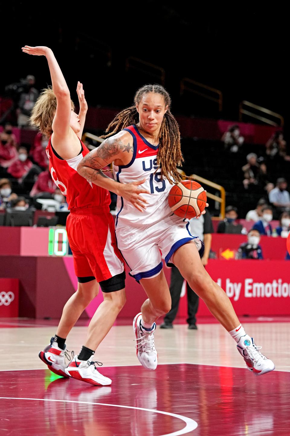 Aug 8, 2021; Saitama, Japan; United States centre Brittney Griner (15) drives to the basket against Japan centre Maki Takada (8) in the women's basketball gold medal match during the Tokyo 2020 Olympic Summer Games at Saitama Super Arena. Mandatory Credit: Kyle Terada-USA TODAY Sports