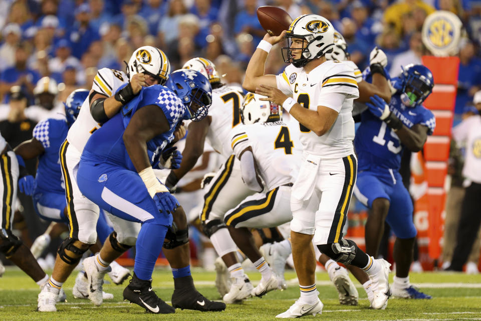 Missouri quarterback Connor Bazelak (8) throws a pass during the first half of an NCAA college football game against Kentucky in Lexington, Ky., Saturday, Sept. 11, 2021. (AP Photo/Michael Clubb)