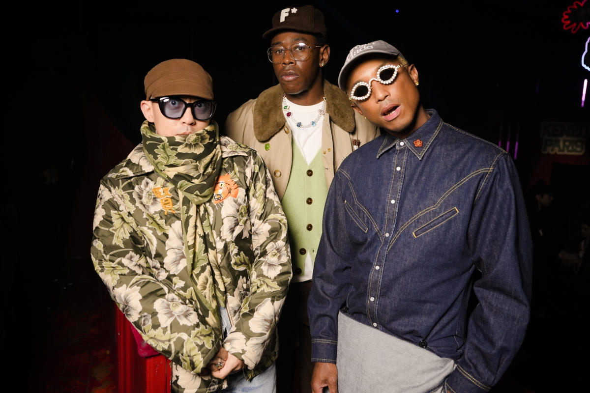 PHARRELL WILLIAMS, WIFE AND SON POSE IT UP DURING PFW 2023