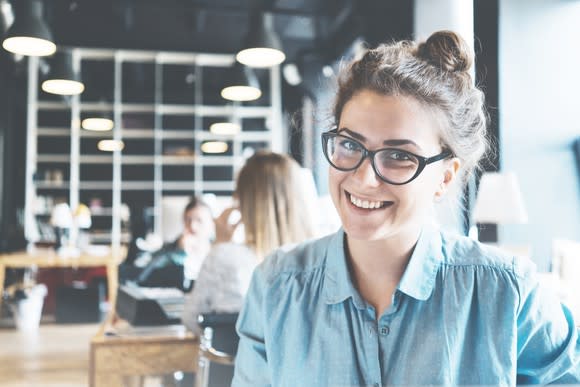 Smiling young female professional