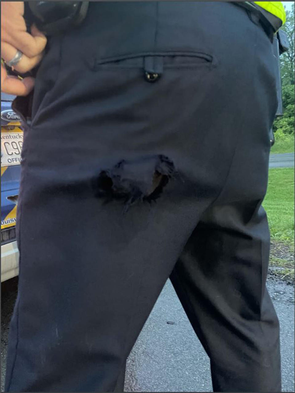 Officer's torn pants after incident with golfer Scottie Scheffler.  (Louisville Metro Police Department)