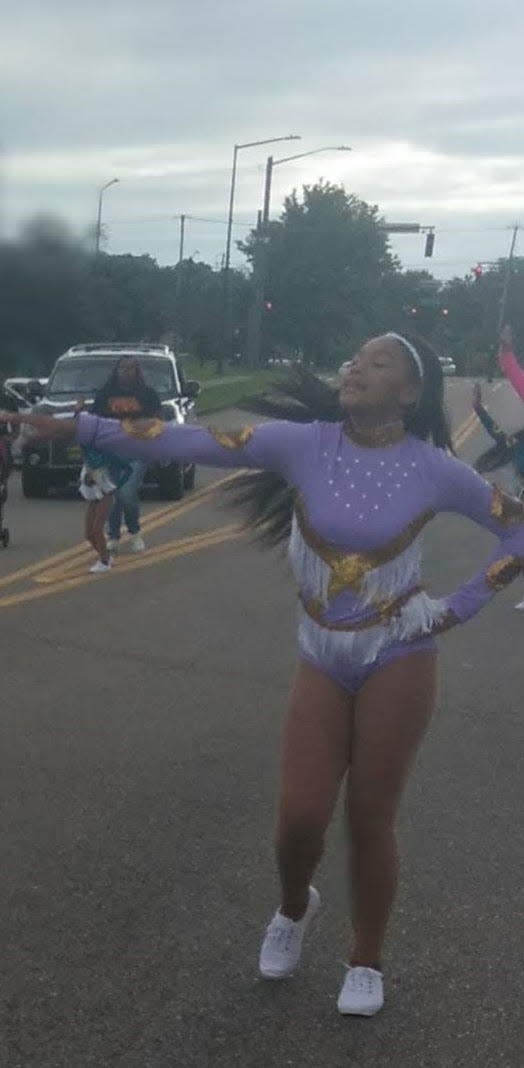 Janaria Muhammad dances in the street at the Austin-East homecoming parade September 28, 2018. Her friends and dance coaches remember a girl who had a signature smile and passion for dance.